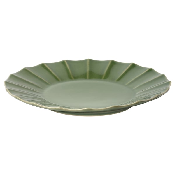 Green glazed stoneware plate, scalloped edge, handcrafted design.