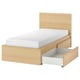 Wooden MALM bed with beige finish, minimalist design, 2 storage drawers on wheels.