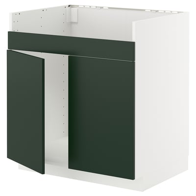 A METOD kitchen cabinet in white with dark green doors and drawer. The cabinet has a modern, streamlined design with a 25-year guarantee.