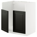 METOD kitchen unit with black beveled doors.