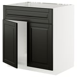 Modern black and white METOD kitchen cabinet with sleek, beveled edges.