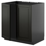 Black modern kitchen cabinet, sleek, rectangular, with beveled edges. Part of ikeas METOD system.