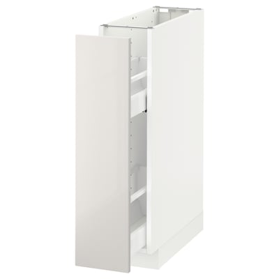 An open white ikea METOD kitchen cabinet with an integrated pull-out drawer, showcasing its modern design and storage capabilities.