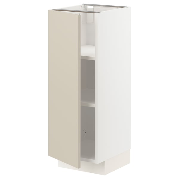 A beige METOD kitchen cabinet with smooth edges, adjustable shelves, and nickel-plated hinges. Its a slim, tall, and rectangular design.