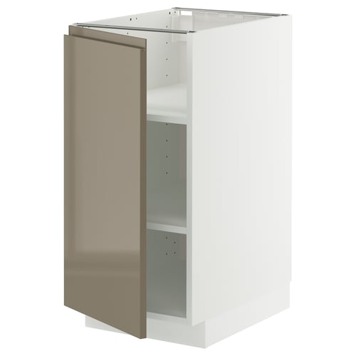 A white METOD kitchen cabinet with a dark gray-brown high gloss door partially open, revealing an adjustable shelf inside.