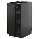 Modern METOD kitchen unit in black with beveled edges and wire shelves.