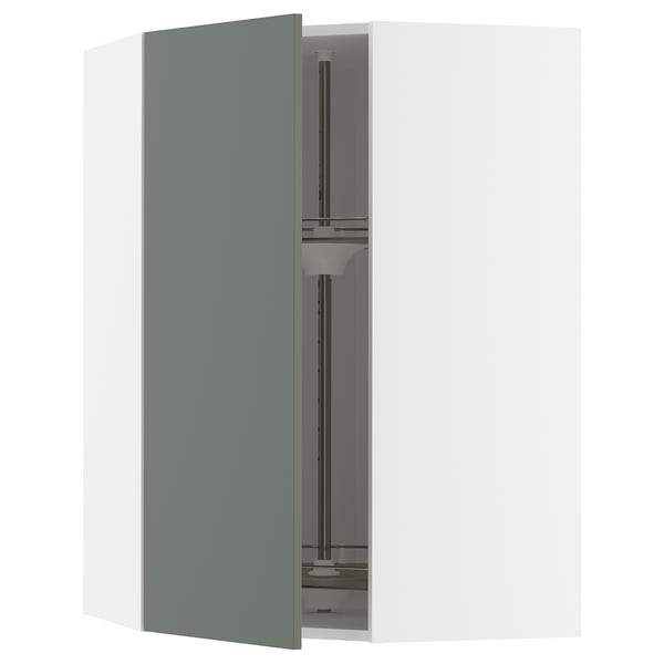 Set of modern grey-green kitchen cabinets with metallic hardware, featuring sleek design and adjustable shelves.