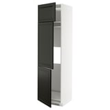 A tall, white cabinet with black doors from the METOD kitchen system, featuring a sleek design and adjustable shelves.