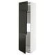 A tall, white cabinet with black doors from the METOD kitchen system, featuring a sleek design and adjustable shelves.