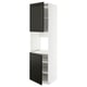 White ikea METOD kitchen cabinet with black doors and shelves.