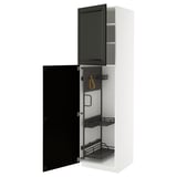 A modern white METOD kitchen cabinet with black bodbyn doors open, revealing inner shelves and organizers in black and yellow.