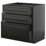 A sleek black METOD kitchen unit with beveled drawer fronts, three drawers and one cabinet, featuring a glossy finish.