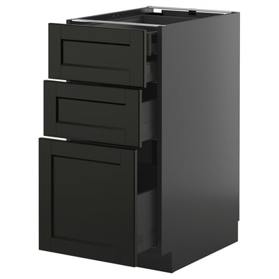 Modern black kitchen cabinet with three open drawers, sleek design, metallic handles.