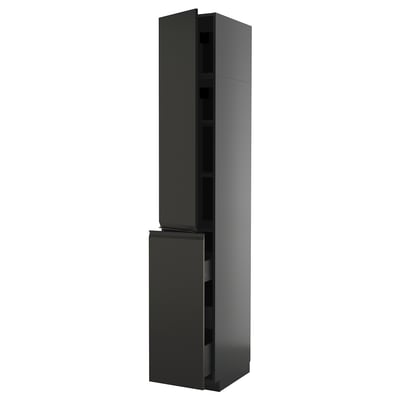 Image shows a tall, sleek black METOD kitchen cabinet with a modern design, featuring a drawer and adjustable shelf.