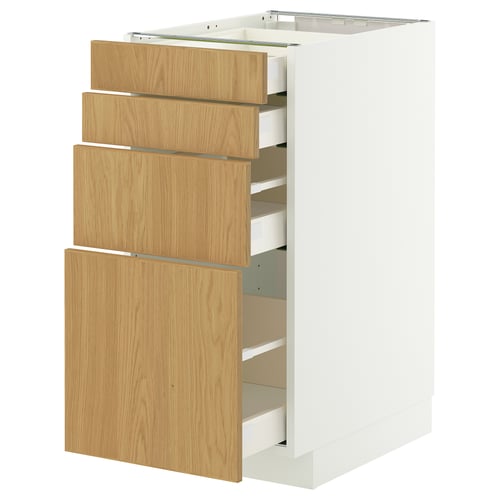 A METOD white kitchen cabinet with light wood drawers, featuring three drawers stacked vertically.