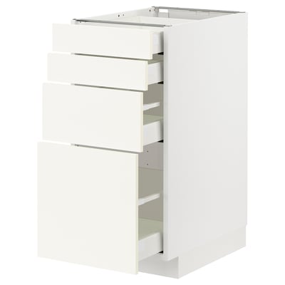 White ikea METOD kitchen cabinet with multiple pull-out drawers.