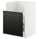Black beveled kitchen cabinet, white frame, modern design.