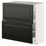 A black and white METOD kitchen cabinet with sleek, beveled edges and multiple storage drawers.