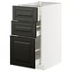 Modern black and white kitchen cabinet with pull-out drawers.