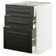 Modern kitchen unit: white cabinet with black, beveled edgar drawers.