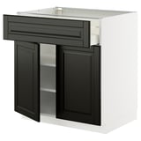 METOD kitchen unit in black with white top. Drawer and double doors, modern design.