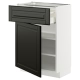 A METOD kitchen unit with a black beveled door and a matching drawer, framed in white. It has shelves for storage and a sleek, modern design.