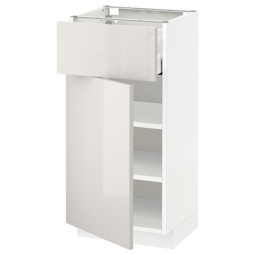 Modern white METOD cabinet, glossy finish, one door, one adjustable shelf.