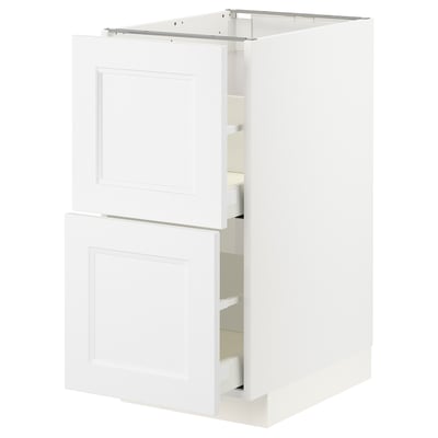 A white METOD kitchen cabinet with two doors and two drawers. It a sleek, modern design with a sturdy frame and smooth-running drawers.