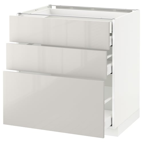 Modern white METOD kitchen unit. Three drawers, glossy finish, sleek design.
