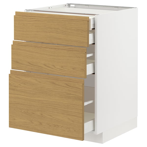 Modern kitchen cabinet with oak drawers and white base.