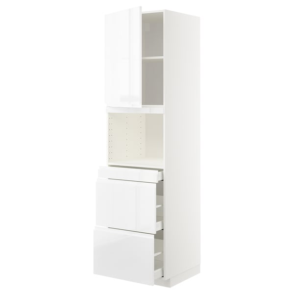 White high gloss towers from ikeas METOD kitchen system with handle-less drawers.