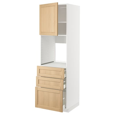 White METOD cabinet with light wood drawers and door, classic warm feel.