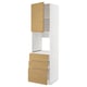 A METOD kitchen cabinet with a white frame, light brown wood-look doors, and drawers, featuring minimalist handles and a warm feel.