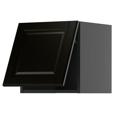 Black kitchen cabinet with glossy finish, angled view, sleek modern design, high contrast edges.