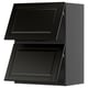 Black kitchen cabinet set with beveled edges and 2 open drawers.