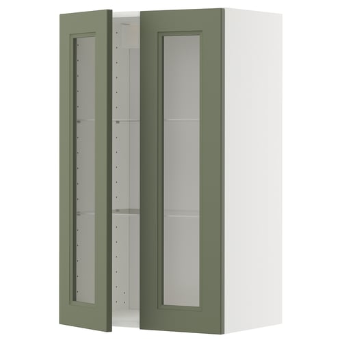 A green METOD kitchen cabinet with glass doors and a white frame, offering a modern design and adjustable shelves.