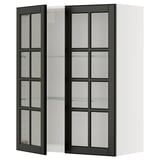 Modern black glass-door cabinet with beveled edges, offering a sleek, sophisticated look for organizing and displaying items.
