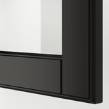 Close-up of sleek, black framed glass cabinet door with beveled edges, showcasing high-quality design and sturdy construction.