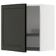 Modern black kitchen cabinet with beveled edges, white interior and adjustable shelf.