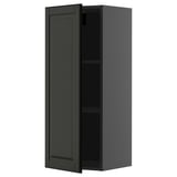Black METOD kitchen wall cabinet. Sleek, tall, rectangular shape with one adjustable shelf. Modern, minimalist design with beveled edges.