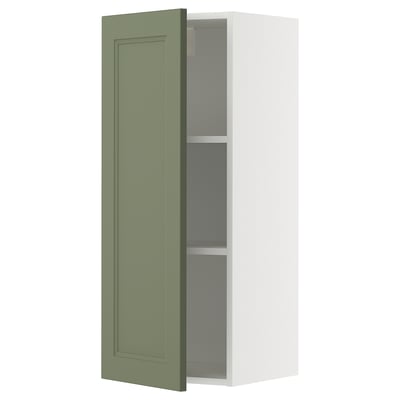 White METOD kitchen cabinet with green door and two shelves.
