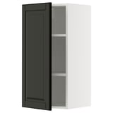 Black & white kitchen cabinet. Open door reveals shelf inside.