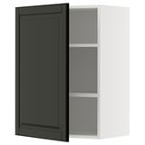 A modern, black METOD kitchen cabinet with a white frame and adjustable shelves.
