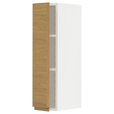 White and oak METOD kitchen cabinet with minimalist design and nickel-plated hinges.