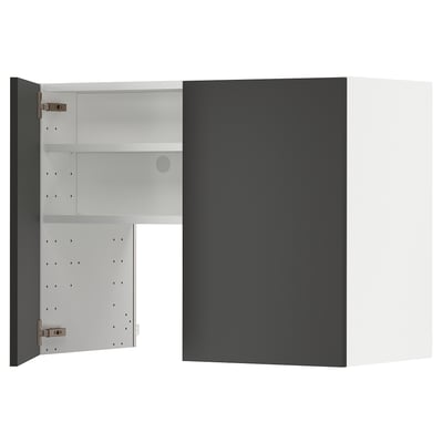 A modern, black kitchen cabinet with a white interior, adjustable shelves, and metallic hinges.
