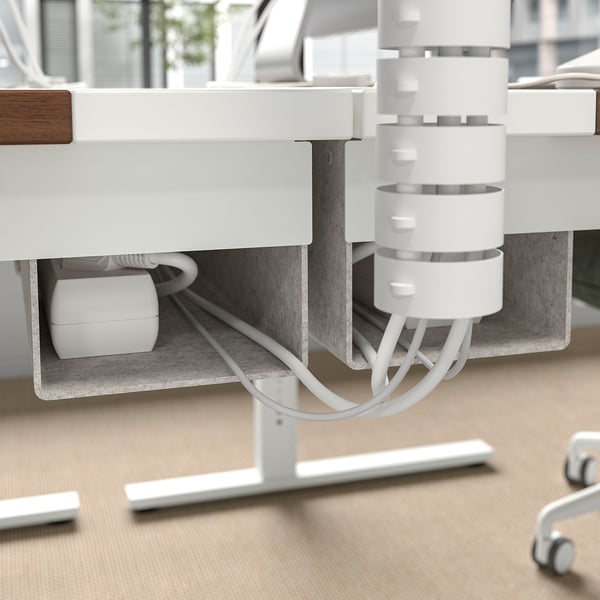 MITTZON desks cable management tray stores and organizes cables under the table, keeping the workspace tidy and safe. .