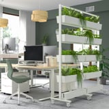 MITTZON mobile plant divider with green shelves.