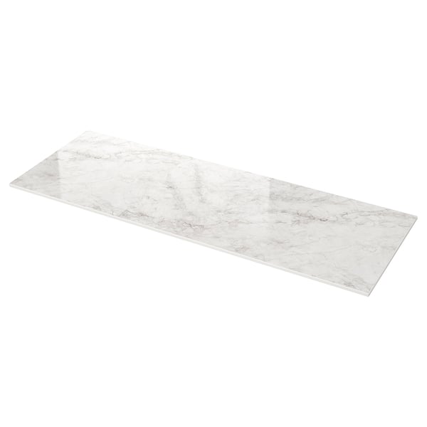 MÖCKLARP white rectangular marble-patterned worktop with rounded edges.