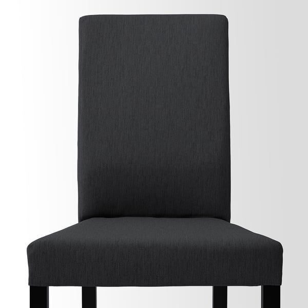 Dark grey fabric dining chair, high back, padded seat, sturdy wooden legs.