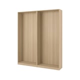 An ikea PAX wooden wardrobe frame in light oak. Its rectangular, empty, with a sturdy, foldable design.